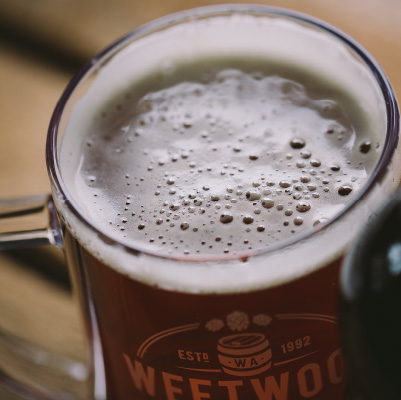 Close up of a Weetwood Ales Pint.